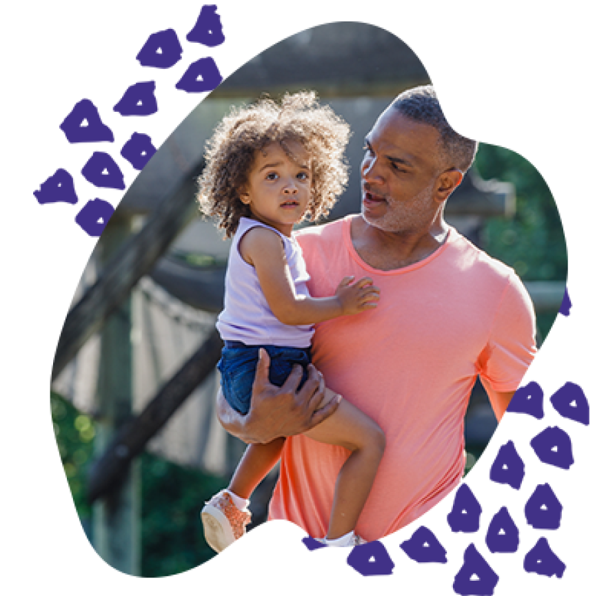 dad with kid on his hip