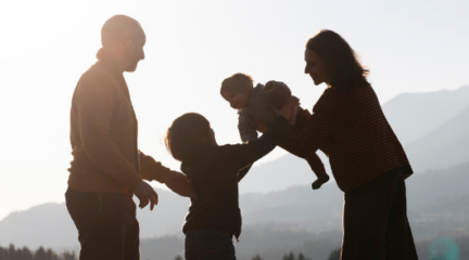 Silhouette of family with kids